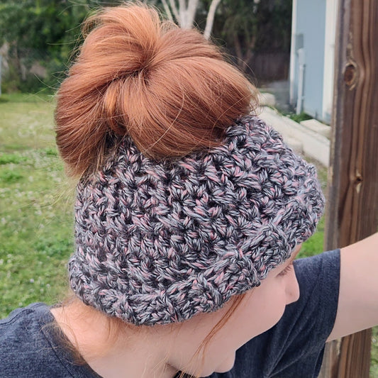 Salem Creek Colored top bun hat on my granddaughters head